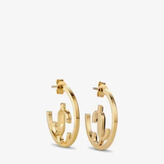 Aros Jc Monogram de metal con acabado dorado Aros Jc Monogram