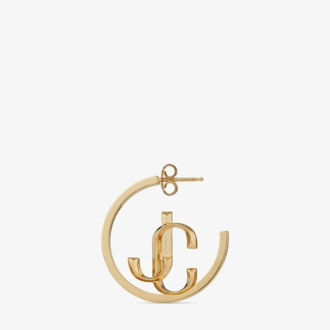 Aros Jc Monogram de metal con acabado dorado Aros Jc Monogram Aros Jc Monogram de metal con acabado dorado Aros Jc Monogram