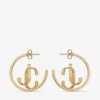 Aros Jc Monogram de metal con acabado dorado Aros Jc Monogram Aros Jc Monogram de metal con acabado dorado Aros Jc Monogram