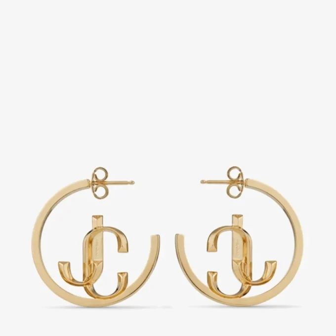 Aros Jc Monogram de metal con acabado dorado Aros Jc Monogram Aros Jc Monogram de metal con acabado dorado Aros Jc Monogram
