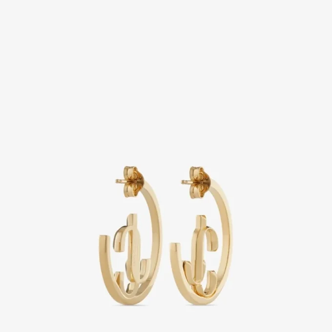 Aros Jc Monogram de metal con acabado dorado Aros Jc Monogram Aros Jc Monogram de metal con acabado dorado Aros Jc Monogram