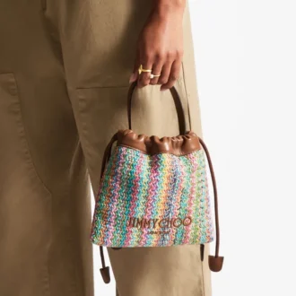 Bolsa con cordón y asa superior Bolsa con cordón de rafia multicolor y marrón claro con diseño en zigzag y ribetes de cuero