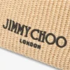 Bolsa con cordón y asa superior Bolsa con cordón de rafia suave natural y negra con ribetes de cuero Bolsa con cordón y asa superior Bolsa con cordón de rafia suave natural y negra con ribetes de cuero