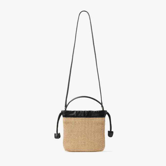Bolsa con cordón y asa superior Bolsa con cordón de rafia suave natural y negra con ribetes de cuero Bolsa con cordón y asa superior Bolsa con cordón de rafia suave natural y negra con ribetes de cuero