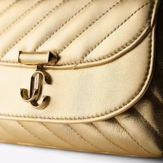 Bolso bandolera pequeño Curve en piel napa metalizada acolchada dorada Bolso bandolera pequeño Curve en piel napa metalizada acolchada dorada