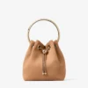Bolso Bon Bon de ante color toffee con cierre de esfera metálica Bolso Bon Bon de ante color toffee con cierre de esfera metálica