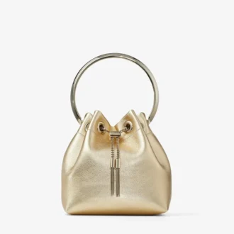 Bolso Bon Bon de napa metalizada dorada con asa metálica