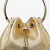 Bolso Bon Bon de napa metalizada dorada con asa metálica Bolso Bon Bon de napa metalizada dorada con asa metálica