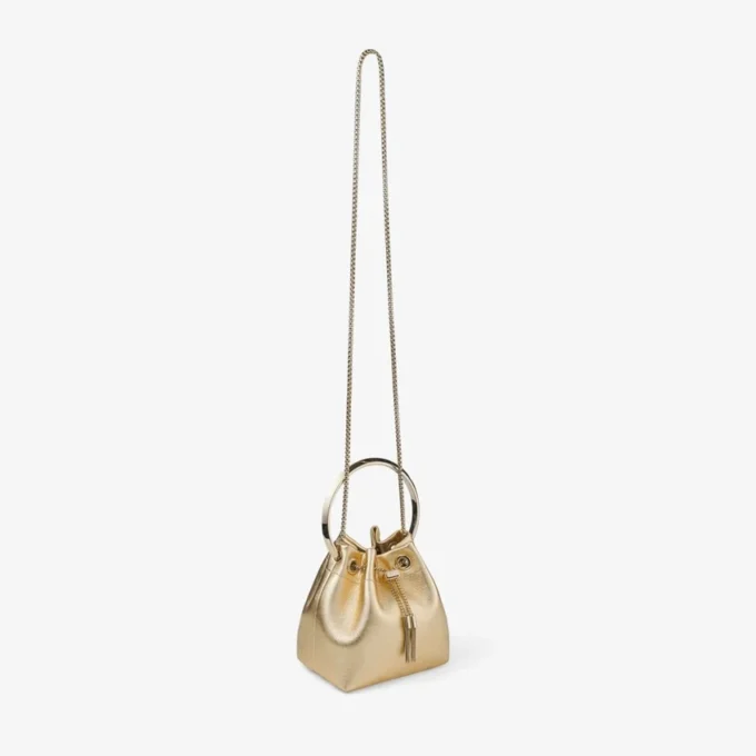 Bolso Bon Bon de napa metalizada dorada con asa metálica Bolso Bon Bon de napa metalizada dorada con asa metálica