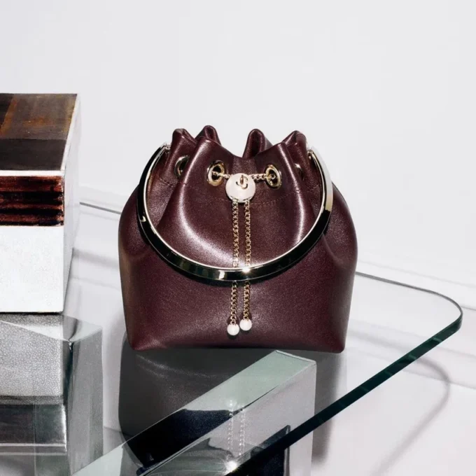 Bolso Bon Bon de piel Biker en color merlot intenso con cierre de perla