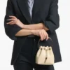 Bolso Bon Bon de piel con estampado Elaphe en color amarillo mantequilla Bolso Bon Bon de piel con estampado Elaphe en color amarillo mantequilla