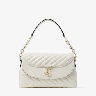 Bolso con asa superior Curve de piel napa acolchada color latte con detalles de perlas