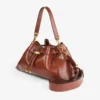 Bolso de hombro mediano Cinch en piel estampada de elaphe color coñac con costuras de cuero estilo Biker