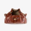 Bolso de hombro mediano Cinch en piel estampada de elaphe color coñac con costuras de cuero estilo Biker