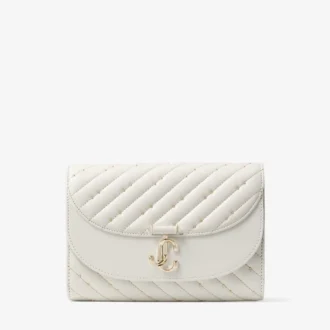 Bolso de mano Avenue Curve Clutch de piel napa acolchada color latte