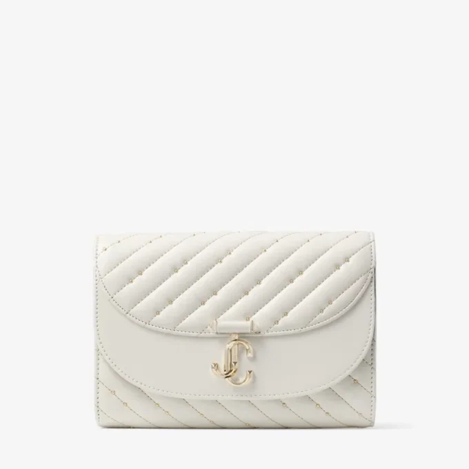 Bolso de mano Avenue Curve Clutch de piel napa acolchada color latte Bolso de mano Avenue Curve Clutch de piel napa acolchada color latte
