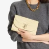 Bolso de mano Curve Bolso de mano de cuero Biker acolchado en color Buttermilk