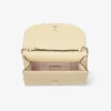 Bolso de mano Curve Bolso de mano de cuero Biker acolchado en color Buttermilk