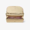 Bolso de mano Curve: bolso de mano de piel metalizada acolchada en dorado brillante con cadena Bolso de mano Curve: bolso de mano de piel metalizada acolchada en dorado brillante con cadena
