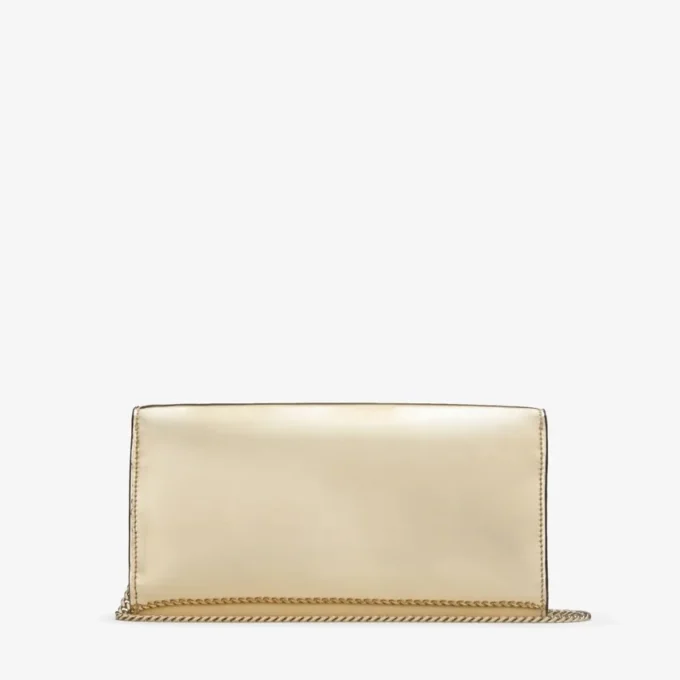 Bolso de mano Emmie de tela dorada espejada Bolso de mano Emmie de tela dorada espejada