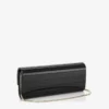 Bolso de mano Sweetie de acrílico negro con correa de cadena dorada