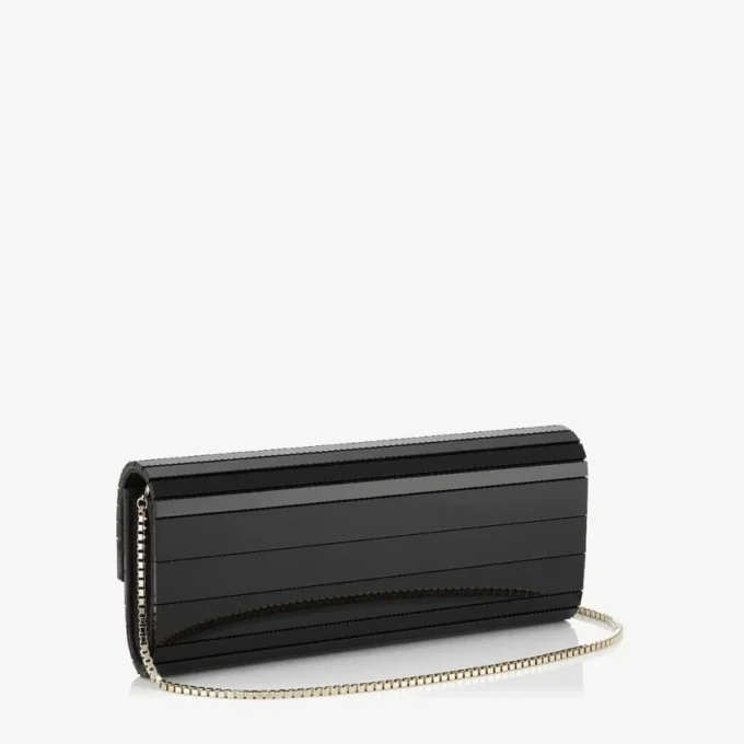 Bolso de mano Sweetie de acrílico negro con correa de cadena dorada