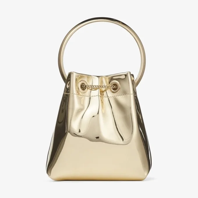 Bolso mini Bon Bon de tela dorada espejada con asa metálica