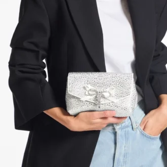 Bolso mini con lazo suave Bolso mini de satén marfil con lazo de cristales