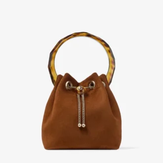 Bolso tipo cubo Bon Bon de ante marrón claro con cierre de cuentas y asa de carey