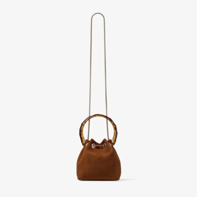 Bolso tipo cubo Bon Bon de ante marrón claro con cierre de cuentas y asa de carey
