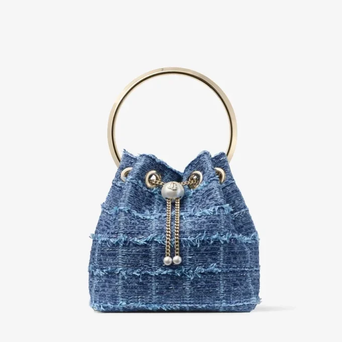 Bolso tipo cubo Bon Bon de tejido vaquero con diseño entrecruzado Bolso tipo cubo Bon Bon de tejido vaquero con diseño entrecruzado