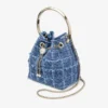 Bolso tipo cubo Bon Bon de tejido vaquero con diseño entrecruzado Bolso tipo cubo Bon Bon de tejido vaquero con diseño entrecruzado