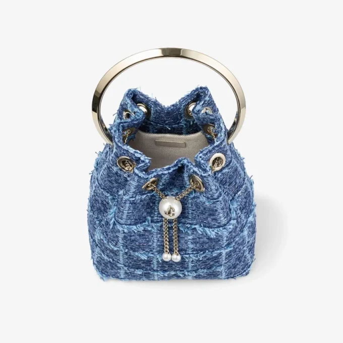 Bolso tipo cubo Bon Bon de tejido vaquero con diseño entrecruzado Bolso tipo cubo Bon Bon de tejido vaquero con diseño entrecruzado