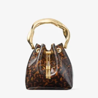 Bolso tipo cubo Bon Bon transparente en carey con asa esculpida