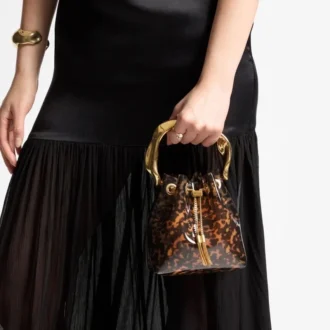 Bolso tipo cubo Bon Bon transparente en carey con asa esculpida