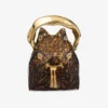 Bolso tipo cubo Bon Bon transparente en carey con asa esculpida Bolso tipo cubo Bon Bon transparente en carey con asa esculpida