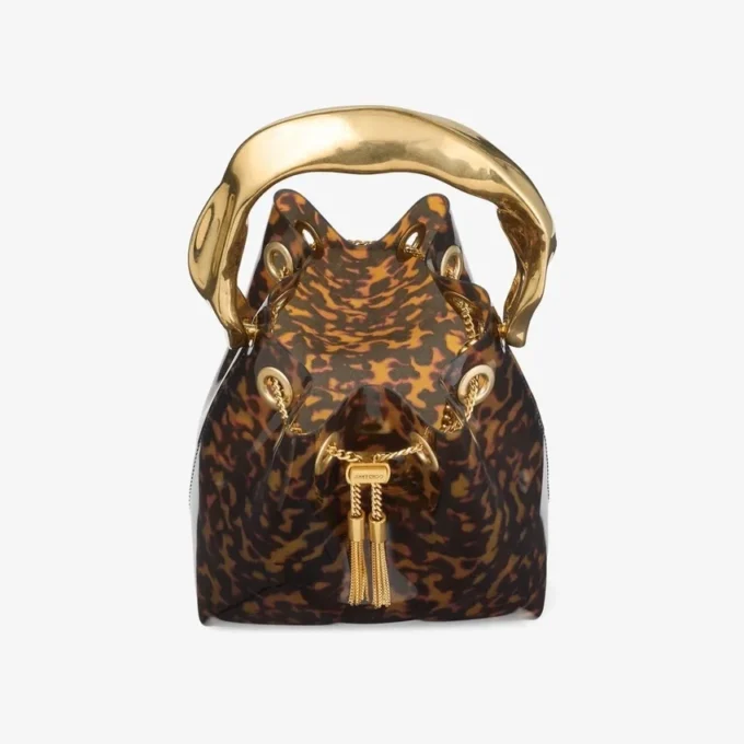 Bolso tipo cubo Bon Bon transparente en carey con asa esculpida Bolso tipo cubo Bon Bon transparente en carey con asa esculpida