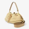 Bolso tipo cubo Cinch mediano de rafia con cuentas en tonos natural y capuchino y piel de becerro lisa