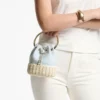 Bolso tipo cubo de lona moteada y mimbre Bon Bon en azul Riviera Bolso tipo cubo de lona moteada y mimbre Bon Bon en azul Riviera