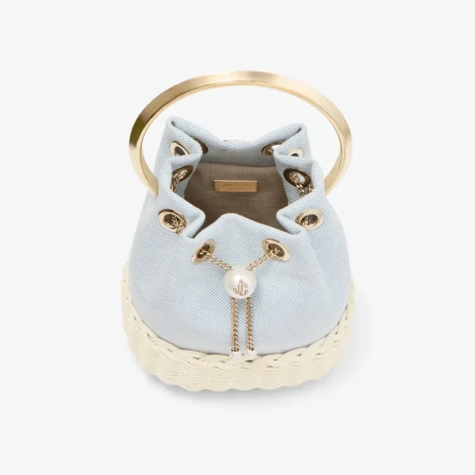 Bolso tipo cubo de lona moteada y mimbre Bon Bon en azul Riviera Bolso tipo cubo de lona moteada y mimbre Bon Bon en azul Riviera