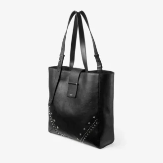 Bolso tote vertical Bar mediano Bolso tote de piel de becerro de grano suave en negro con estrellas texturizadas