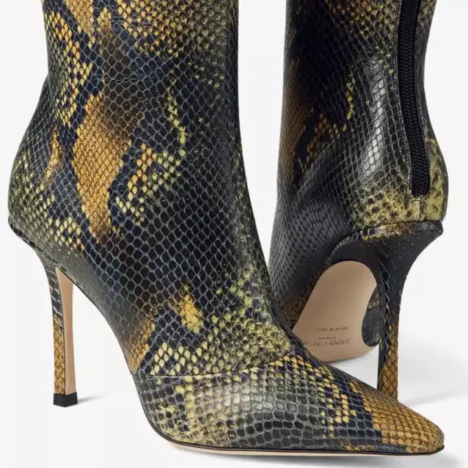 Botas de piel con estampado de pitón hasta la rodilla Botas de piel con estampado de pitón hasta la rodilla