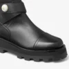 Botas planas de cuero negro Meena Botas planas de cuero negro Meena