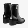 Botines Adry 60 en charol negro y piel napa con charm de perla Botines Adry 60 en charol negro y piel napa con charm de perla
