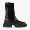Botines Tamia planos de piel de becerro brillante en negro con tejido de punto trenzado Botines Tamia planos de piel de becerro brillante en negro con tejido de punto trenzado