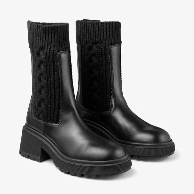 Botines Tamia planos de piel de becerro brillante en negro con tejido de punto trenzado Botines Tamia planos de piel de becerro brillante en negro con tejido de punto trenzado
