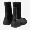 Botines Tamia planos de piel de becerro brillante en negro con tejido de punto trenzado Botines Tamia planos de piel de becerro brillante en negro con tejido de punto trenzado