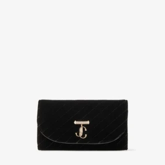 Cartera Curve con cadena. Mini bolso de terciopelo acolchado negro con barra JC de cristales