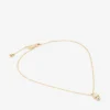 Colgante Jc Pearl Cube de metal dorado con perla y cubo de cristal Colgante Jc Pearl Cube de metal dorado con perla y cubo de cristal