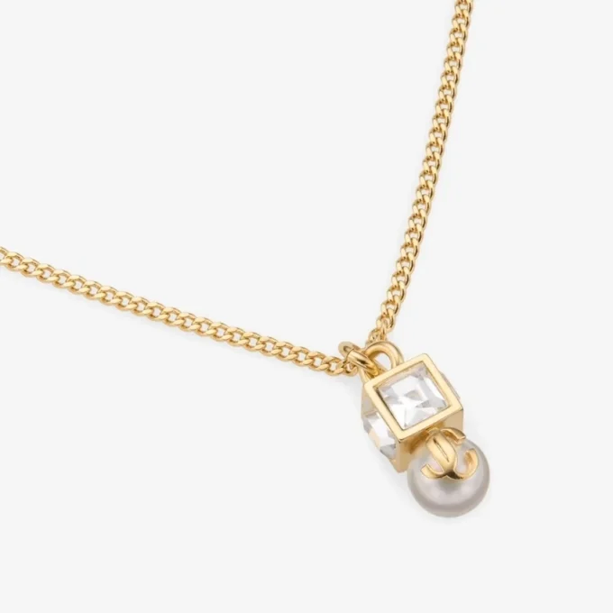 Colgante Jc Pearl Cube de metal dorado con perla y cubo de cristal Colgante Jc Pearl Cube de metal dorado con perla y cubo de cristal
